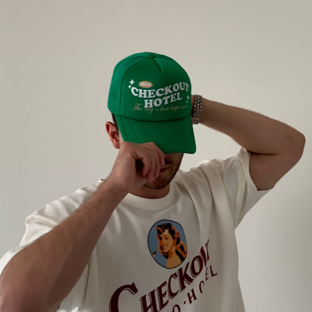 Checkout Hotel Trucker Hat